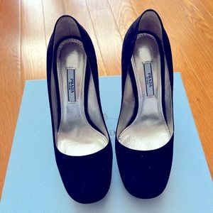 PRADA black suede platform pumps.